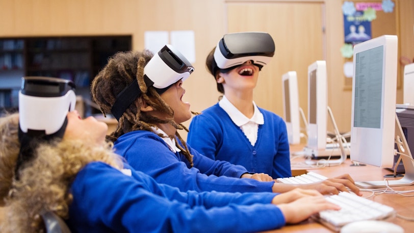 Stock Students with VR headsets 3 664198918